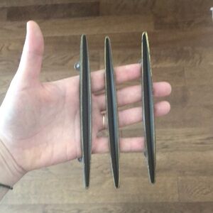 Vintage Set of Three Black and Gold Drawer Pulls